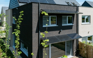 Werfbezoek aan de eerste Energie+ woning in België in opbouw door Qubo