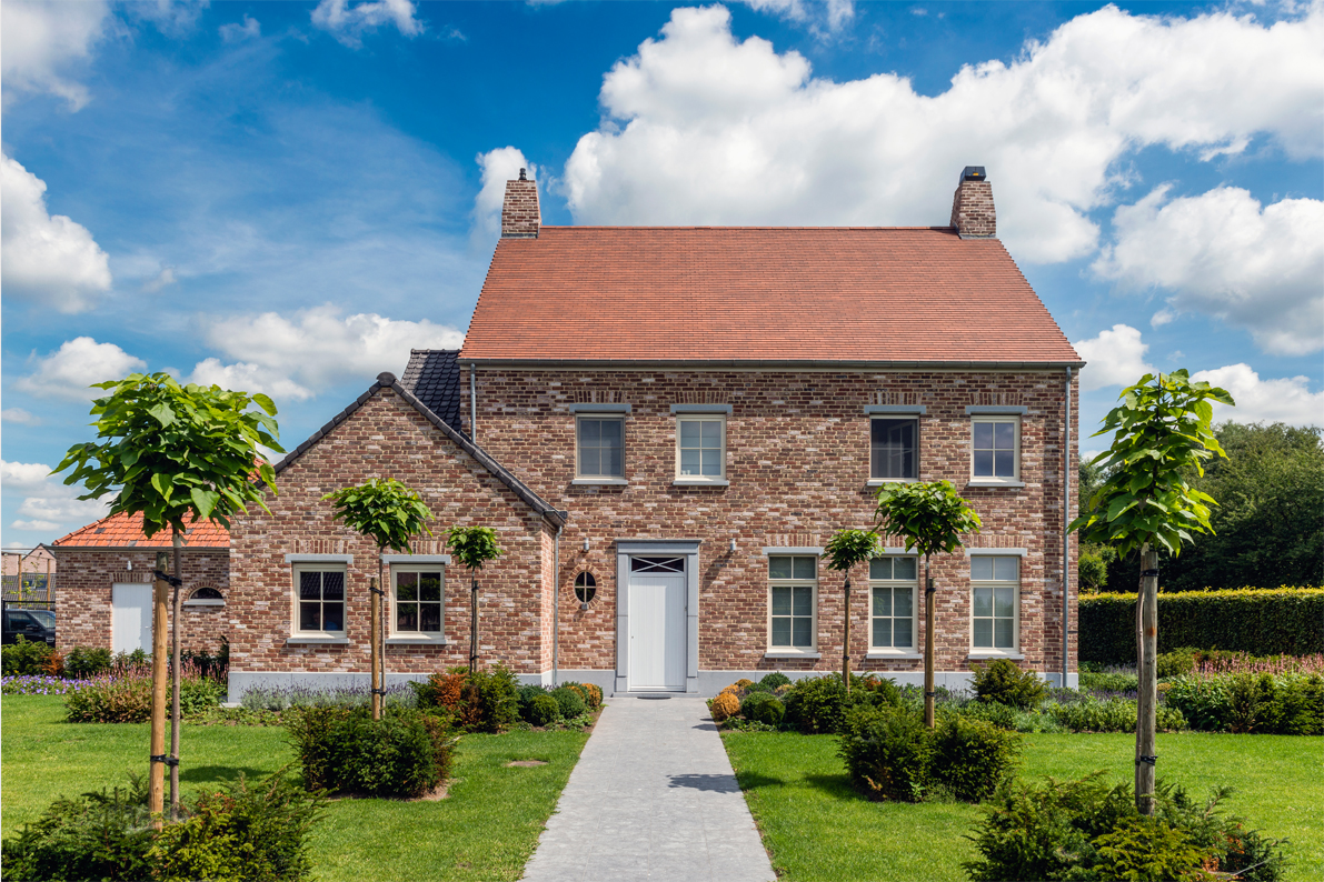 Pastoriewoning met twee soorten dakpannen